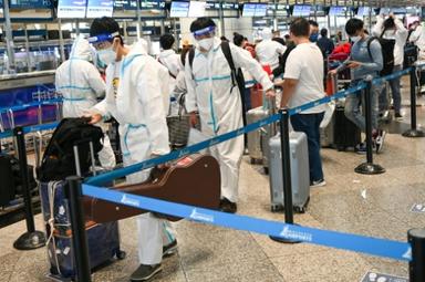 Touristes à l'aéroport